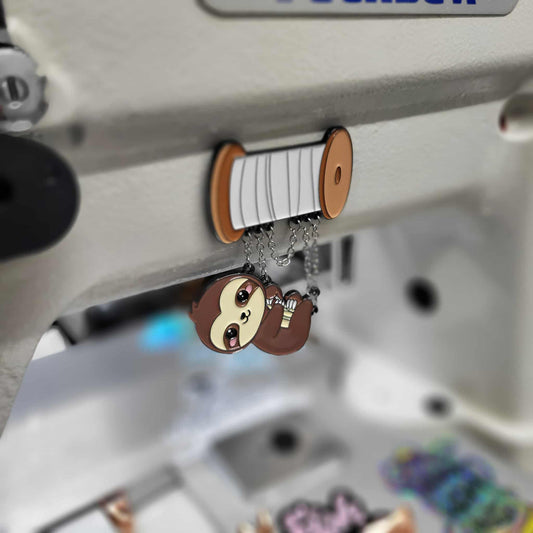 "Hangin By a Thread" Magnet